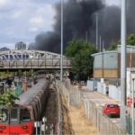 Neasden fire near Wembley stadium: 125 firefighters battle massive blaze as London underground suspended